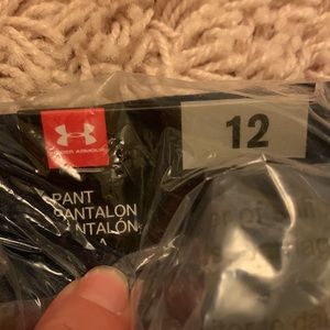New in plastic wrap UA Match play pants 12